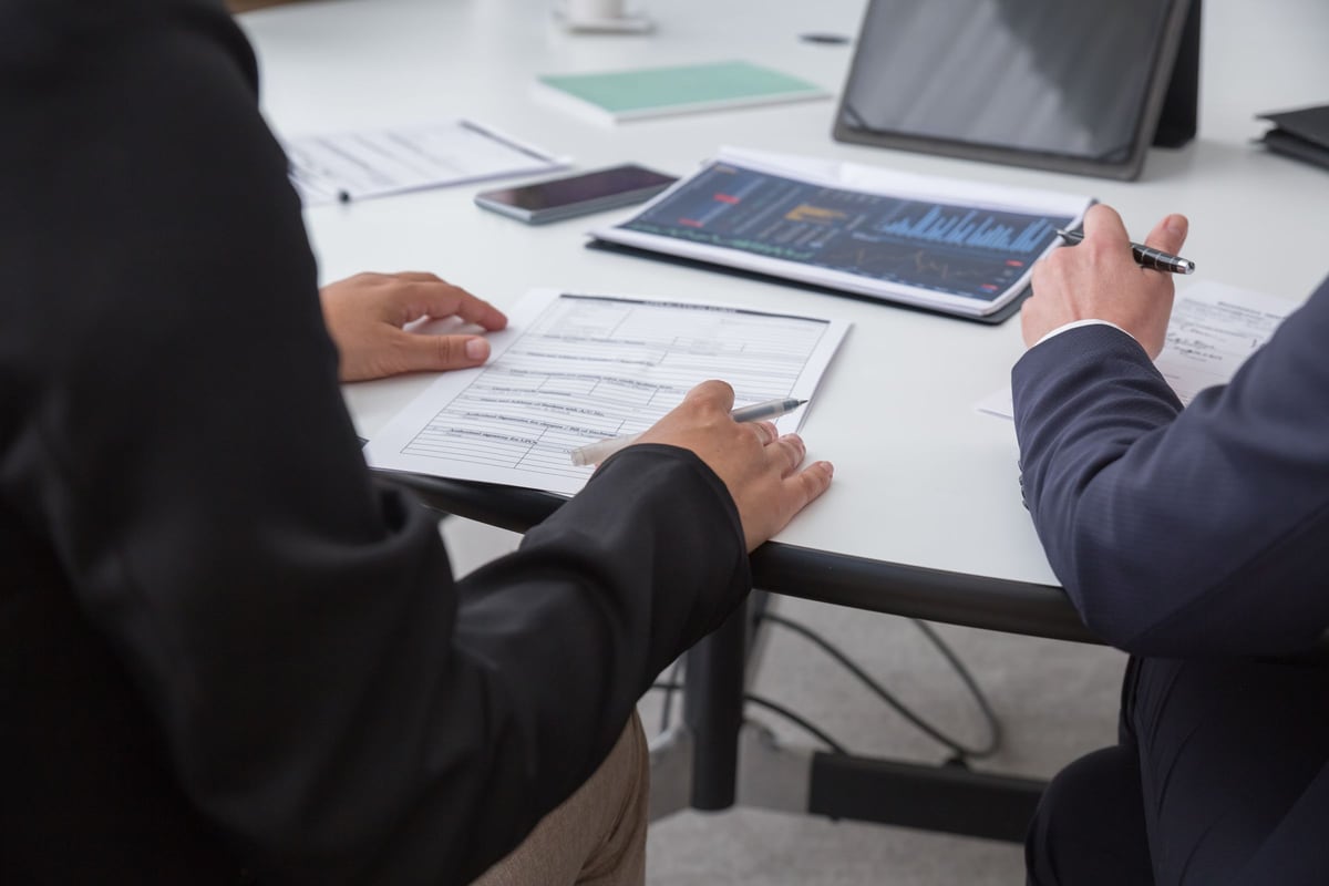 A digital planning session at a conference table