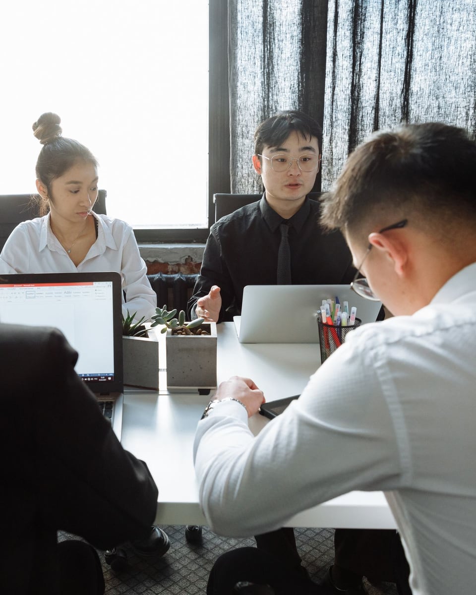 Business professionals reviewing an international operating plan