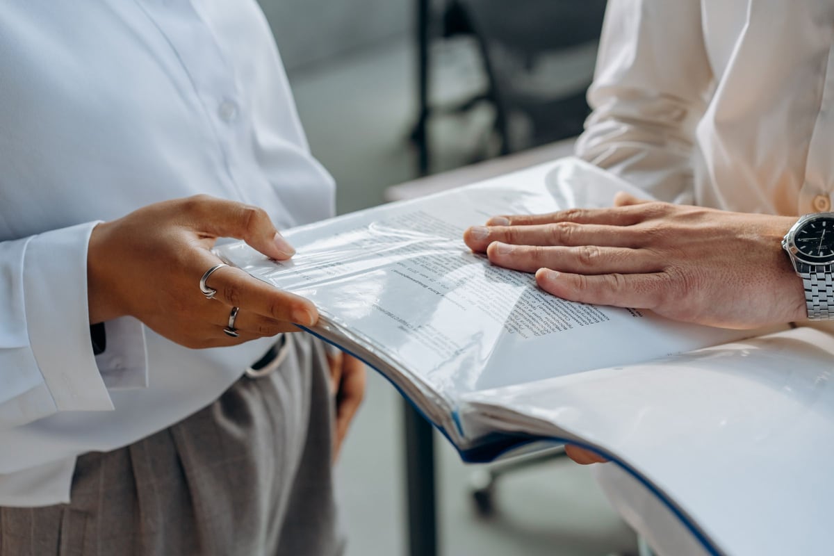 Professionals coordinating transaction documents